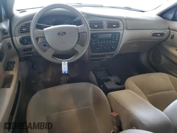 ✅ 2004 Ford Taurus SE • VIN: 1FAHP58U14A138414 • Lot: 86698364. Listed on Copart with 124,028 mi. Free auction sales archive from the USA and detailed vehicle history report at DreamBid. Image 8.