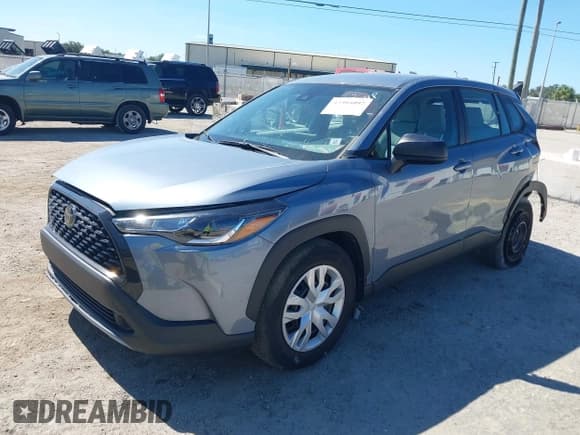 ✅ 2022 Toyota Corolla Cross L • VIN: 7MUAAAAG7NV029721 • Лот: 43304097. Опубликован ранее на IAAI с пробегом 31 139 миль. Бесплатный доступ к архиву аукционных продаж из США и подробный отчёт об истории автомобиля на DreamBid. Изображение 2.