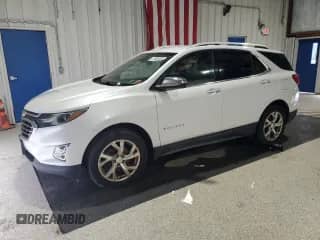 2018 Chevrolet Equinox Premier с VIN 2GNAXVEV6J6164385, выставлен на аукционе Copart как лот 80213225 с пробегом 82 081 миль миль и Чистый • Clean title. История ставок и продаж доступна на DreamBid. Изображение 1.