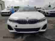 2020 BMW 3 Series M340i z VIN WBA5U7C07LFH55758, wystawiony jako Copart lot #71877665 z przebiegiem Nie podano mil oraz Szkoda całkowita • Salvage title. Historia ofert i sprzedaży dostępna na DreamBid. Obrazek 5.