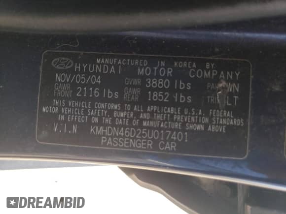 2005 Hyundai Elantra GLS z VIN KMHDN46D25U017401, wystawiony jako Copart lot #74989384 z przebiegiem 145 123 mil mil oraz Szkoda całkowita • Salvage title. Historia ofert i sprzedaży dostępna na DreamBid. Obrazek 13.