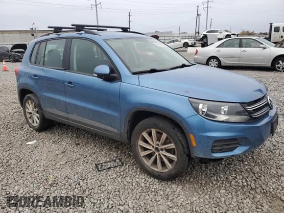 ✅ 2018 Volkswagen Tiguan • VIN: WVGBV7AX3JK000381 • Лот: 90780535. Опубликован ранее на Copart с пробегом 182 632 миль. Бесплатный доступ к архиву аукционных продаж из США и подробный отчёт об истории автомобиля на DreamBid. Изображение 4.