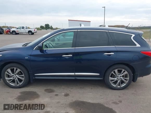 ✅ 2015 Infiniti QX60 • VIN: 5N1AL0MM6FC531425 • Lot: 43557709. Listed on IAAI with 189,990 mi. Free auction sales archive from the USA and detailed vehicle history report at DreamBid. Image 15.