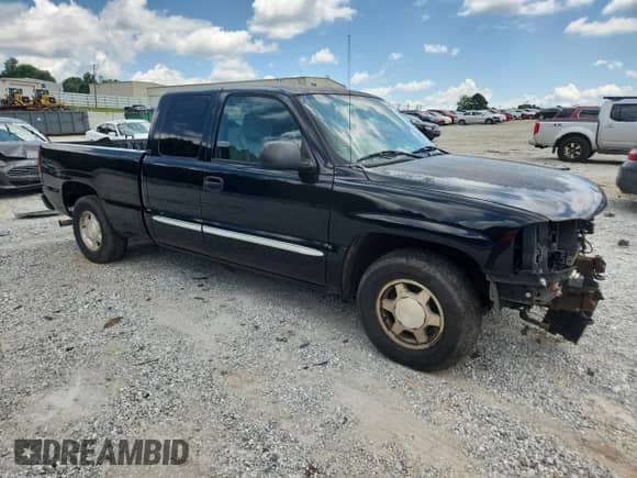 2004 GMC Sierra 1500 SLE with VIN 2GTEC19V741126562, listed as a Copart auction lot 64492065 with 351,273 mi miles and Salvage title. Bid and sale history available at DreamBid. Image 4.