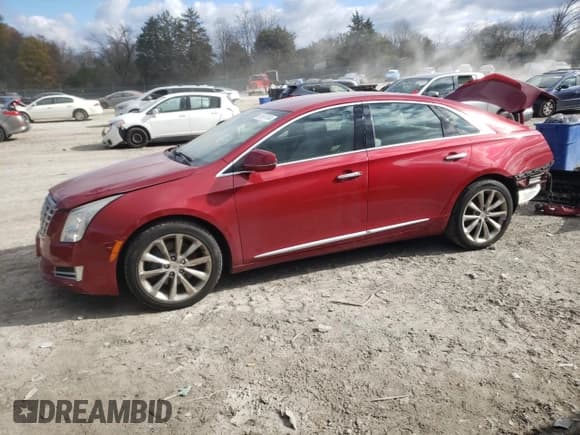 ✅ 2013 Cadillac XTS Luxury • VIN: 2G61P5S35D9141293 • Лот: 81697344. Опубликован ранее на Copart с пробегом 134 571 миль. Бесплатный доступ к архиву аукционных продаж из США и подробный отчёт об истории автомобиля на DreamBid. Изображение 1.