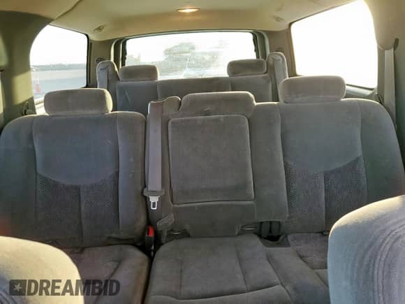 2003 Chevrolet Suburban Z71 z VIN 3GNFK16Z53G154565, wystawiony jako Copart lot #85582955 z przebiegiem 304 431 mil mil oraz Szkoda całkowita • Salvage title. Historia ofert i sprzedaży dostępna na DreamBid. Obrazek 10.