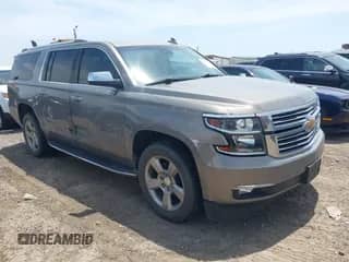 2019 Chevrolet Suburban Premier with VIN 1GNSCJKC9KR264210, listed as a IAAI auction lot 42238540 with 53,256 mi miles and . Bid and sale history available at DreamBid. Image 1.
