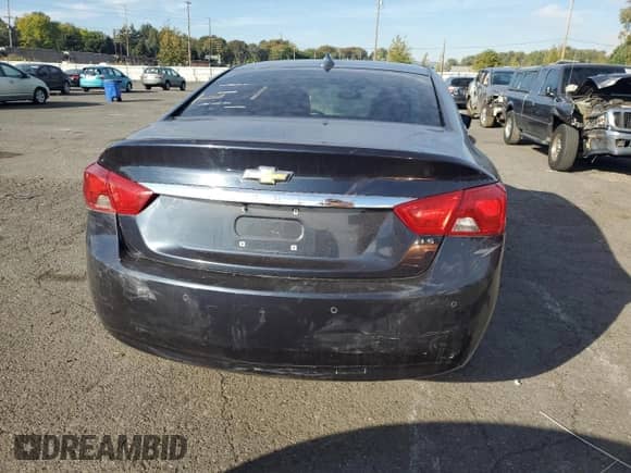 2014 Chevrolet Impala LS with VIN 2G11X5SL4E9229565, listed as a Copart auction lot 87112785 with 134,771 mi miles and Clean title. Bid and sale history available at DreamBid. Image 6.