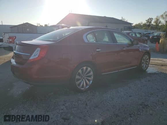 ✅ 2015 Lincoln MKS • VIN: 1LNHL9EK1FG604788 • Лот: 70561565. Опубликован ранее на Copart с пробегом 132 839 миль. Бесплатный доступ к архиву аукционных продаж из США и подробный отчёт об истории автомобиля на DreamBid. Изображение 3.