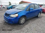 ✅ 2013 Suzuki SX4 LE • VIN: JS2YC5A32D6100013 • Lot: 42918706. Wystawiony na IAAI z przebiegiem 184 918 mil. Bezpłatny archiwum sprzedaży aukcyjnych z USA i szczegółowy raport historii pojazdu na DreamBid. Zdjęcie 20.