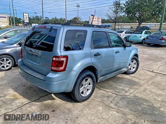 ✅ 2008 Ford Escape Hybrid • VIN: 1FMCU49H38KD32513 • Lot: 97445345. Wystawiony na Copart z przebiegiem 223 211 mil. Bezpłatny archiwum sprzedaży aukcyjnych z USA i szczegółowy raport historii pojazdu na DreamBid. Zdjęcie 4.