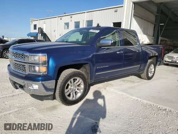 2015 Chevrolet Silverado 1500 LTZ with VIN 3GCUKSEC9FG525833, listed as a Copart auction lot 87082825 with 129,711 mi miles and Salvage title. Bid and sale history available at DreamBid. Image 1.