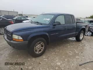 2002 Dodge Dakota Sport с VIN 1B7HL38N22S545507, выставлен на аукционе Copart как лот 80643314 с пробегом 181 125 миль миль и Списание • Salvage title. История ставок и продаж доступна на DreamBid. Изображение 1.