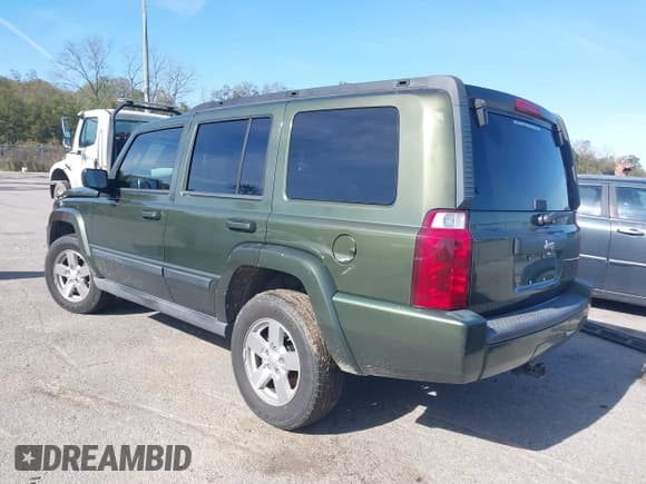 ✅ 2007 Jeep Commander Sport • VIN: 1J8HH48K67C533772 • Lot: 41033399. Listed on IAAI with 295,552 mi. Free auction sales archive from the USA and detailed vehicle history report at DreamBid. Image 3.