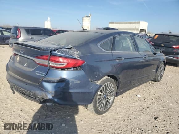 ✅ 2018 Ford Fusion Titanium • VIN: 3FA6P0RU0JR143274 • Лот: 92927235. Опубликован ранее на Copart с пробегом Не указан. Бесплатный доступ к архиву аукционных продаж из США и подробный отчёт об истории автомобиля на DreamBid. Изображение 3.