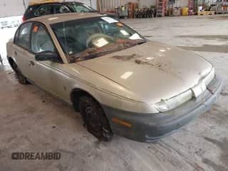 1996 Saturn SL с VIN 1G8ZG5281TZ117924, выставлен на аукционе IAAI как лот 42669030 с пробегом 167 735 миль миль и . История ставок и продаж доступна на DreamBid. Изображение 1.