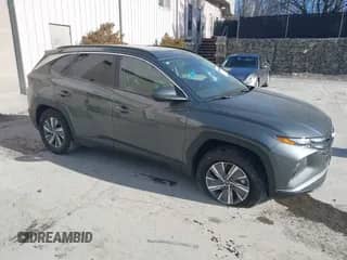 2024 Hyundai Tucson Blue with VIN KM8JBCD15RU214826, listed as a IAAI auction lot 41214421 with 7,473 mi miles and . Bid and sale history available at DreamBid. Image 1.