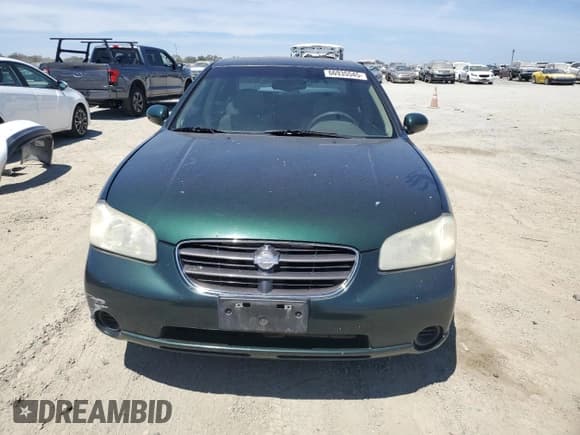 ✅ 2001 Nissan Maxima GXE • VIN: JN1CA31D41T606921 • Лот: 66935545. Опубликован ранее на Copart с пробегом 231 390 миль. Бесплатный доступ к архиву аукционных продаж из США и подробный отчёт об истории автомобиля на DreamBid. Изображение 5.