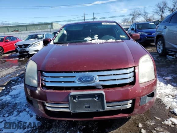 ✅ 2007 Ford Fusion SE • VIN: 3FAHP01177R248056 • Lot: 45878045. Wystawiony na Copart z przebiegiem 185 532 mil. Bezpłatny archiwum sprzedaży aukcyjnych z USA i szczegółowy raport historii pojazdu na DreamBid. Zdjęcie 5.
