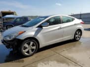 ✅ 2013 Hyundai Elantra GLS • VIN: KMHDH4AEXDU792700 • Lot: 80726745. Listed on Copart with 141,126 mi. Free auction sales archive from the USA and detailed vehicle history report at DreamBid. Image 1.