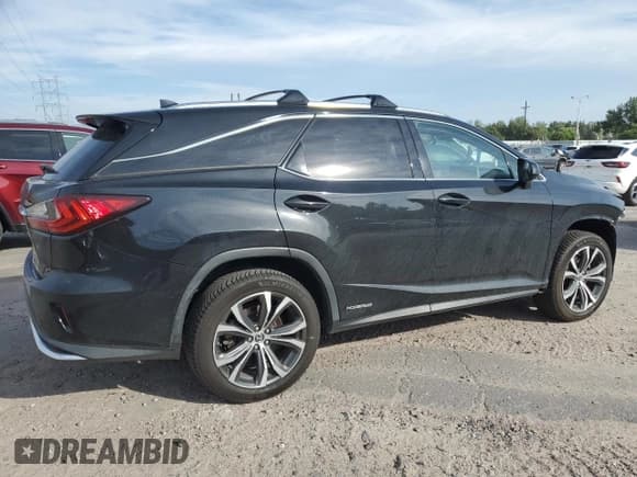 ✅ 2018 Lexus RX 450hL Premium • VIN: JTJDGKCA1J2005997 • Lot: 66119975. Listed on Copart with 105,447 mi. Free auction sales archive from the USA and detailed vehicle history report at DreamBid. Image 3.