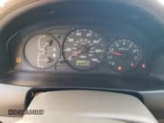 ✅ 2001 Mazda Protege DX • VIN: JM1BJ222410441812 • Лот: 88330565. Опубликован ранее на Copart с пробегом 169 447 миль. Бесплатный доступ к архиву аукционных продаж из США и подробный отчёт об истории автомобиля на DreamBid. Изображение 9.