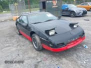 ✅ 1987 Pontiac Fiero GT • VIN: 1G2PG1192HP227632 • Lot: 42473742. Wystawiony na IAAI z przebiegiem 154 396 mil. Bezpłatny archiwum sprzedaży aukcyjnych z USA i szczegółowy raport historii pojazdu na DreamBid. Zdjęcie 1.