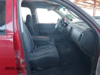 2002 Dodge Dakota SLT z VIN 1B7HL48X72S542335, wystawiony jako IAAI lot #43320738 z przebiegiem 239 957 mil mil oraz . Historia ofert i sprzedaży dostępna na DreamBid. Obrazek 5.