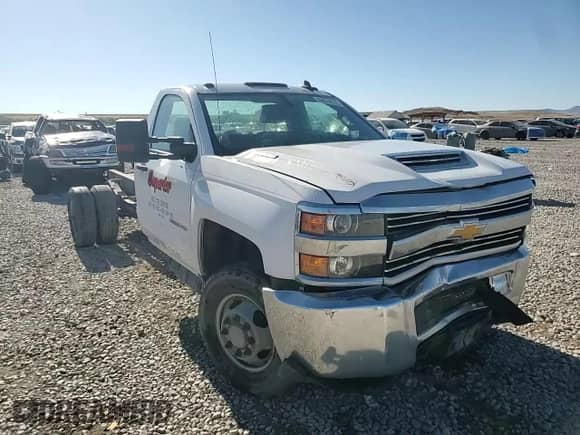 2018 Chevrolet Silverado 3500HD Work Truck with VIN 1GB3KYCY9JF198538, listed as a Copart auction lot 64634115 with 125,003 mi miles and Salvage title. Bid and sale history available at DreamBid. Image 13.