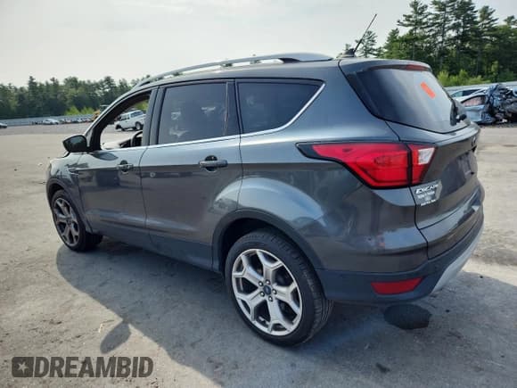 ✅ 2019 Ford Escape Titanium • VIN: 1FMCU9J94KUA84172 • Lot: 67718335. Listed on Copart with 92,829 mi. Free auction sales archive from the USA and detailed vehicle history report at DreamBid. Image 2.