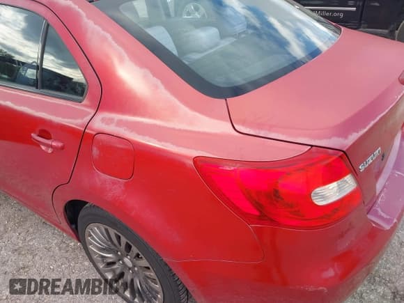 ✅ 2012 Suzuki Kizashi SE • VIN: JS2RE9A31C6101027 • Lot: 41213426. Listed on IAAI with 174,490 mi. Free auction sales archive from the USA and detailed vehicle history report at DreamBid. Image 14.