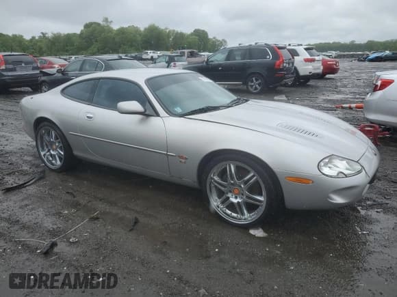 ✅ 2000 Jaguar XK • VIN: SAJJA41B6YPA01802 • Lot: 57146745. Listed on Copart with 32,208 mi. Free auction sales archive from the USA and detailed vehicle history report at DreamBid. Image 4.