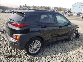 ✅ 2019 Hyundai Kona SEL • VIN: KM8K22AA1KU335622 • Лот: 42183394. Опубликован ранее на Copart с пробегом 49 115 миль. Бесплатный доступ к архиву аукционных продаж из США и подробный отчёт об истории автомобиля на DreamBid. Изображение 3.