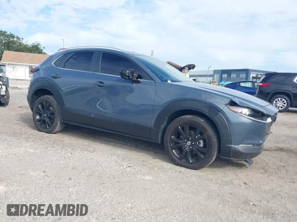 ✅ 2023 Mazda CX-30 S Preferred • VIN: 3MVDMBCM7PM548602 • Лот: 42770195. Опубликован ранее на IAAI с пробегом 22 790 миль. Бесплатный доступ к архиву аукционных продаж из США и подробный отчёт об истории автомобиля на DreamBid. Изображение 1.