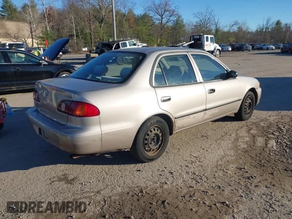 ✅ 2001 Toyota Corolla LE • VIN: 2T1BR12E41C483609 • Lot: 43754685. Listed on IAAI with 118,597 mi. Free auction sales archive from the USA and detailed vehicle history report at DreamBid. Image 4.