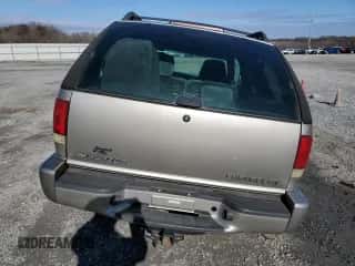 2002 Chevrolet Blazer LS with VIN 1GNCS18W22K217327, listed as a Copart auction lot 85713224 with 122,792 mi miles and Salvage title. Bid and sale history available at DreamBid. Image 6.