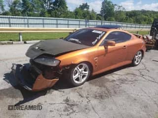 2006 Hyundai Tiburon GT с VIN KMHHN65F66U191134, выставлен на аукционе Copart как лот 56692615 с пробегом 197 093 миль миль и Списание • Salvage title. История ставок и продаж доступна на DreamBid. Изображение 1.