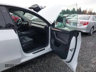 ✅ 2023 Tesla Model Y Long Range • VIN: 7SAYGDEE0PF754492 • Lot: 43654635. Listed on IAAI with 74,943 mi. Free auction sales archive from the USA and detailed vehicle history report at DreamBid. Image 5.