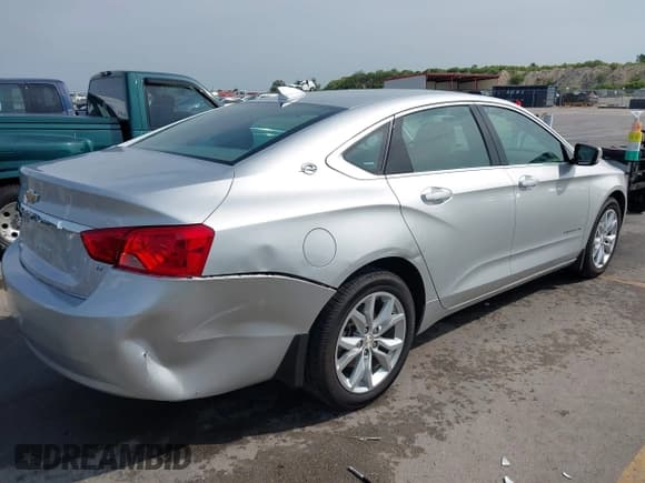 ✅ 2015 Chevrolet Impala LT • VIN: 2G1125S39F9297599 • Lot: 43159187. Listed on IAAI with 60,151 mi. Free auction sales archive from the USA and detailed vehicle history report at DreamBid. Image 4.