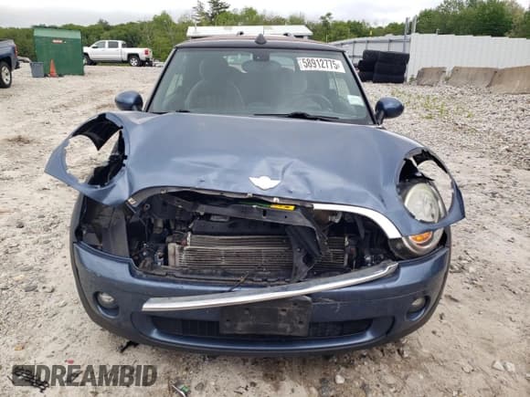 ✅ 2010 MINI Convertible • VIN: WMWMR3C58ATU98333 • Lot: 58912775. Listed on Copart with 82,701 mi. Free auction sales archive from the USA and detailed vehicle history report at DreamBid. Image 5.