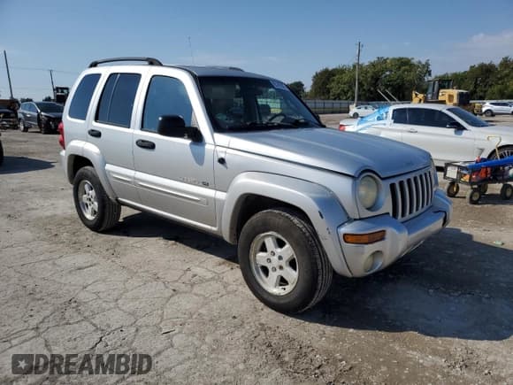 ✅ 2002 Jeep Liberty Limited • VIN: 1J4GK58K82W232738 • Lot: 85145825. Listed on Copart with 190,312 mi. Free auction sales archive from the USA and detailed vehicle history report at DreamBid. Image 4.