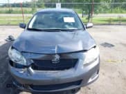 ✅ 2010 Toyota Corolla • VIN: JTDBU4EE0AJ075558 • Lot: 42333233. Listed on IAAI with 98,969 mi. Free auction sales archive from the USA and detailed vehicle history report at DreamBid. Image 12.