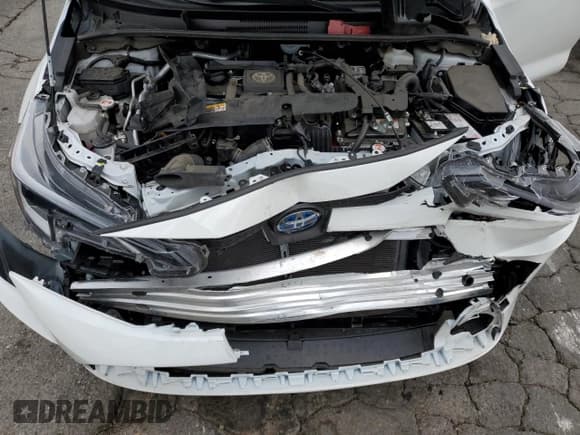 ✅ 2025 Toyota Corolla Hybrid LE • VIN: JTDBCMFE7S3070798 • Лот: 81526655. Опубликован ранее на Copart с пробегом 22 945 миль. Бесплатный доступ к архиву аукционных продаж из США и подробный отчёт об истории автомобиля на DreamBid. Изображение 11.