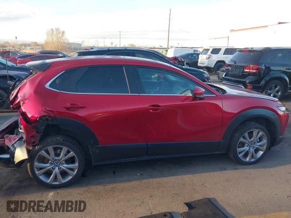 ✅ 2022 Mazda CX-30 S Carbon Edition • VIN: 3MVDMBCL4NM431242 • Lot: 41851636. Listed on IAAI with 40,982 mi. Free auction sales archive from the USA and detailed vehicle history report at DreamBid. Image 13.