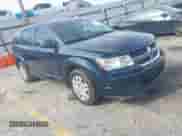 2015 Dodge Journey American Value z VIN 3C4PDCABXFT610861, wystawiony jako IAAI lot #43068421 z przebiegiem 153 937 mil mil oraz . Historia ofert i sprzedaży dostępna na DreamBid. Obrazek 1.