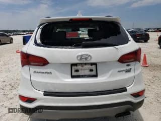 ✅ 2018 Hyundai Santa Fe Ultimate • VIN: 5NMZW4LA1JH084526 • Лот: 55074564. Опубликован ранее на Copart с пробегом 96 531 миль. Бесплатный доступ к архиву аукционных продаж из США и подробный отчёт об истории автомобиля на DreamBid. Изображение 6.