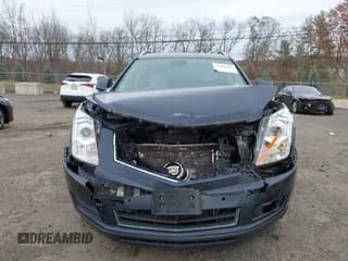 ✅ 2015 Cadillac SRX Luxury Collection • VIN: 3GYFNEE37FS607889 • Lot: 43686485. Listed on IAAI with 155,647 mi. Free auction sales archive from the USA and detailed vehicle history report at DreamBid. Image 6.