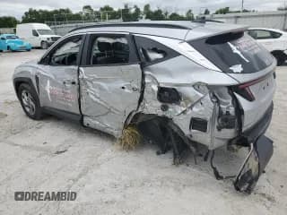 ✅ 2022 Hyundai Tucson SEL • VIN: 5NMJBCAE5NH117770 • Lot: 58112514. Wystawiony na Copart z przebiegiem 123 665 mil. Bezpłatny archiwum sprzedaży aukcyjnych z USA i szczegółowy raport historii pojazdu na DreamBid. Zdjęcie 2.