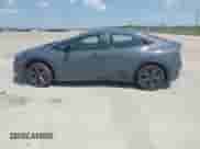 2024 Toyota Prius LE with VIN JTDACAAUXR3032131, listed as a IAAI auction lot 43231631 with 15,535 mi miles and . Bid and sale history available at DreamBid. Image 14.