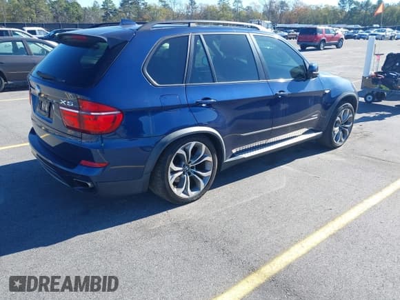 ✅ 2012 BMW X5 50i • VIN: 5UXZV8C59CL425927 • Lot: 43917996. Listed on IAAI with 121,518 mi. Free auction sales archive from the USA and detailed vehicle history report at DreamBid. Image 4.
